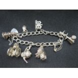 Vintage silver charm bracelet with 8 nice quality charms HM Birmingham 1965 49g