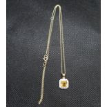 9ct gold citrine and diamond pendant on 18" 9ct gold chain