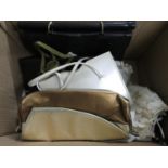 Box of white linen child's dresses and handbags