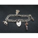 Vintage silver double link charm bracelet with padlock and chain 4 charms HM London 1977 28g