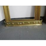 Brass fire surround