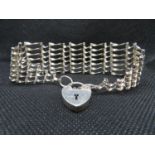 Silver 7 bar gate bracelet with padlock and chain HM London 1975 19g