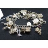 Large fancy charm bracelet weighing 108g silver