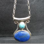 Designer silver pendant set with turquoise and lapiz lazuli on 20" silver belcher link chain 27