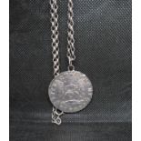 Silver treasure coin pieces of eight dated 1741 on 24" silver belcher link chain (possibly