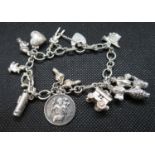 Vintage silver charm bracelet with 12 charms HM Birmingham 1960 47grams