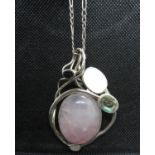 Designer silver pendant set with rose quatrz, abalone and mother of pearl on 20" silver figaro