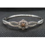 .25carat cognac and white diamond and silver bangle with paperwork 8.75grams