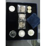 3 silver proof coins, 2x £2 and 1x £5 along with 5x £5 coins and 2x 1989 £2 coins with paperwork