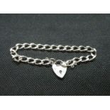 Silver diamond cut curb link bracelet with padlock and chain HM London 1992 13grams