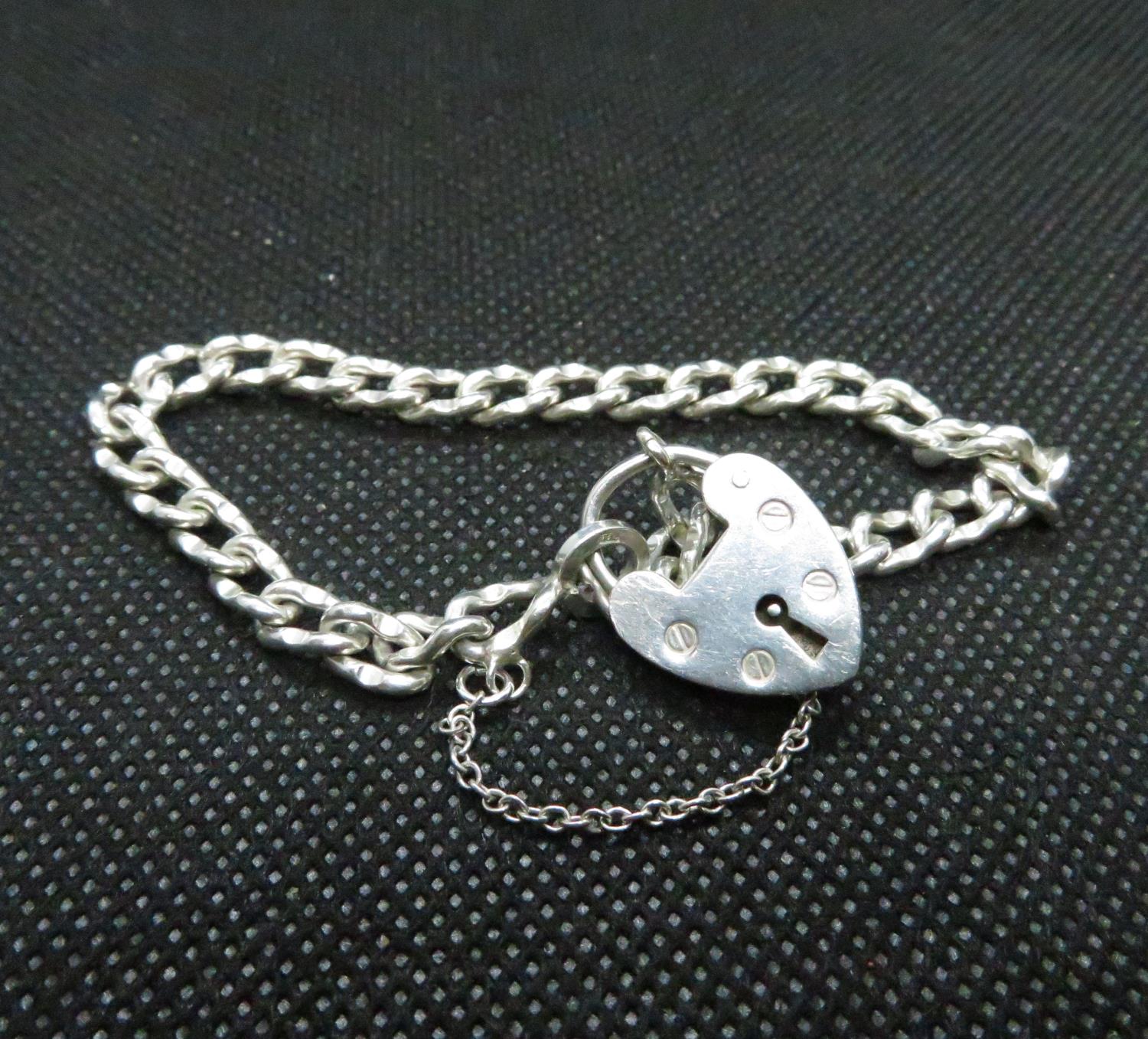 Vintage silver fancy link bracelet with padlock and safety chain London 1975 HM 12.5grams