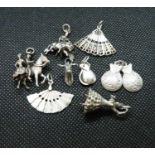 Job lot of 8 spanish themed silver charms 24grams