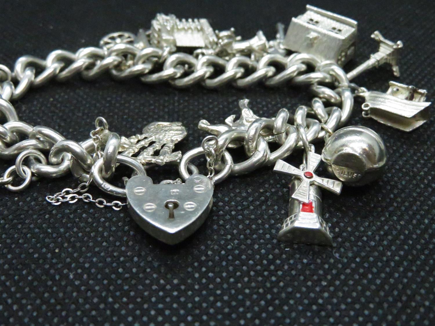 Vintage silver charm bracelet with 15x charms HM London 1955 69grams - Image 3 of 3