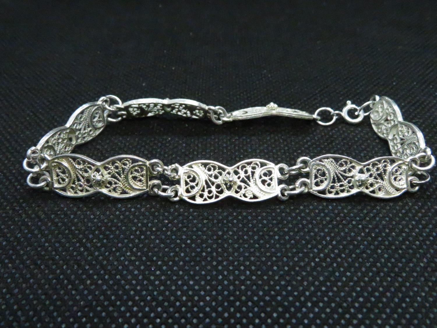 HM 925 silver seven filigree panel bracelet