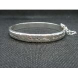 HM Scandia Sterling oval half etched bangle with silver safety chain 13.28grams