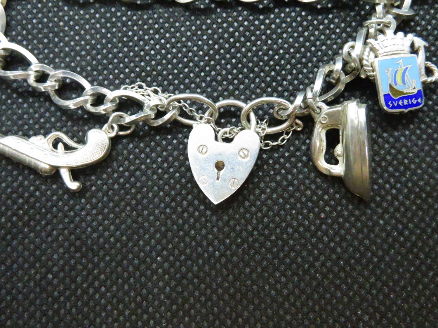 Vintage silver bracelet with 2 charms HM Birmingham 1972 32.5grams - Image 2 of 2