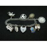 Vintage silver double link charm bracelet with 7x charms London 1979HM