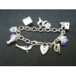 Vintage silver bracelet with 2 charms HM Birmingham 1972 32.5grams