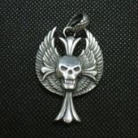 Heavy marked silver skull with flames pendant