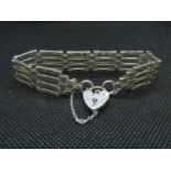 Vintage silver 4 bar gate bracelet with lock and chain HM London 1979 16grams