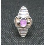 Marked 925 silver cocktail ring set with oval cabouchon amethyst