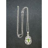Pretty silver pendant set with peridot stone on 18" silver baby belcher link chain