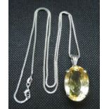 Large yellow stone and silver pendant on long silver chain 20grams total weight