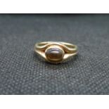 9ct ring with cabochon yellow stone 4.1grams