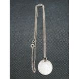 Silver sixpence on silver necklace chain