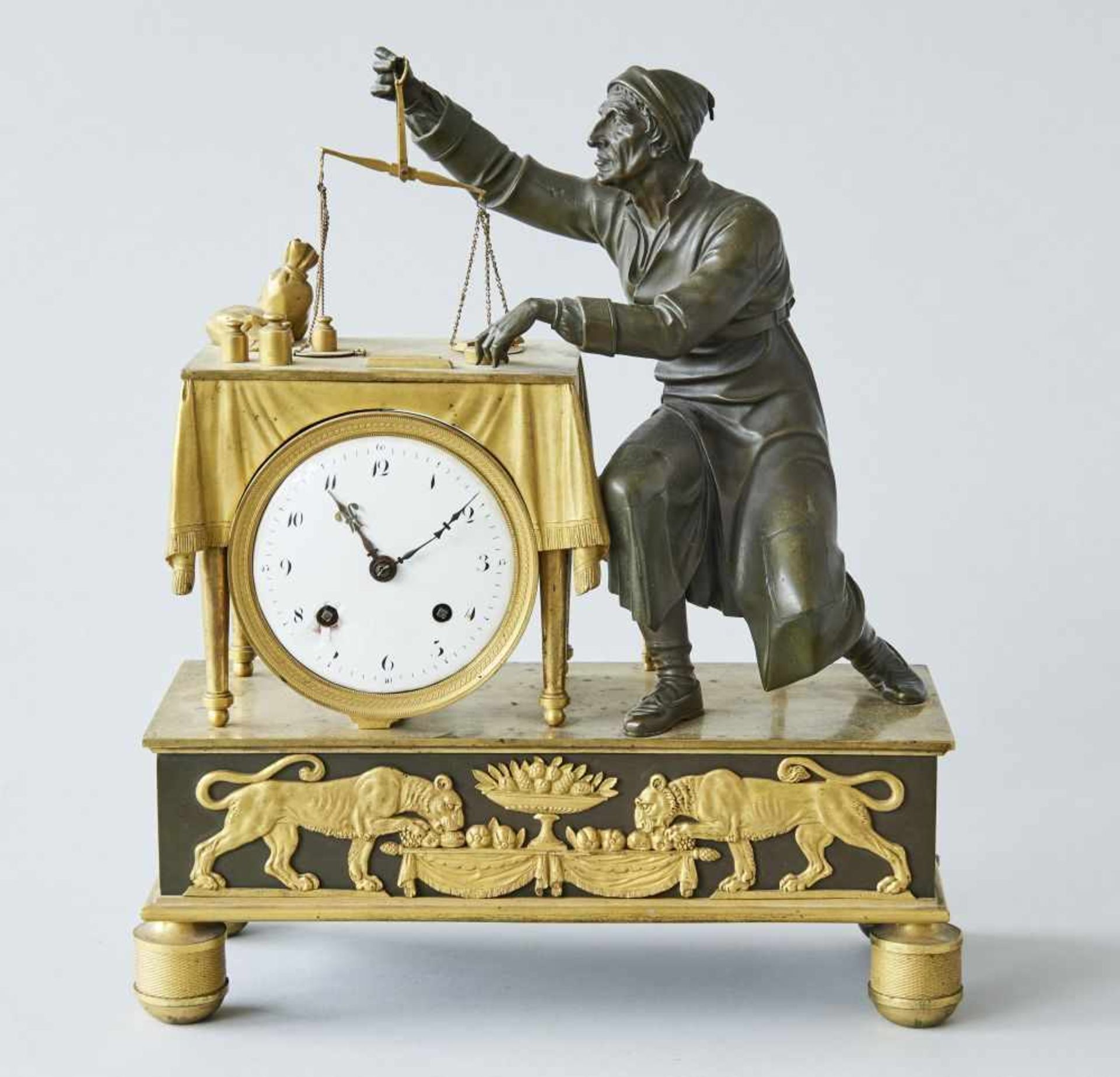 Pendule Frankreich um 1800 - "Der Geldwechsler"Bronze, teils feuervergoldet, Fadenaufhängung, Pendel