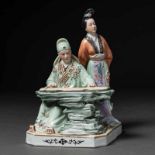 "Pianista con Dama" Grupo escultórico en porcelana china pintada a mano. Trabajo Chino, Siglo