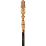 A 19TH CENTURY WALKING CANE, the ivory handle carved in the form of a mitre and with turned and