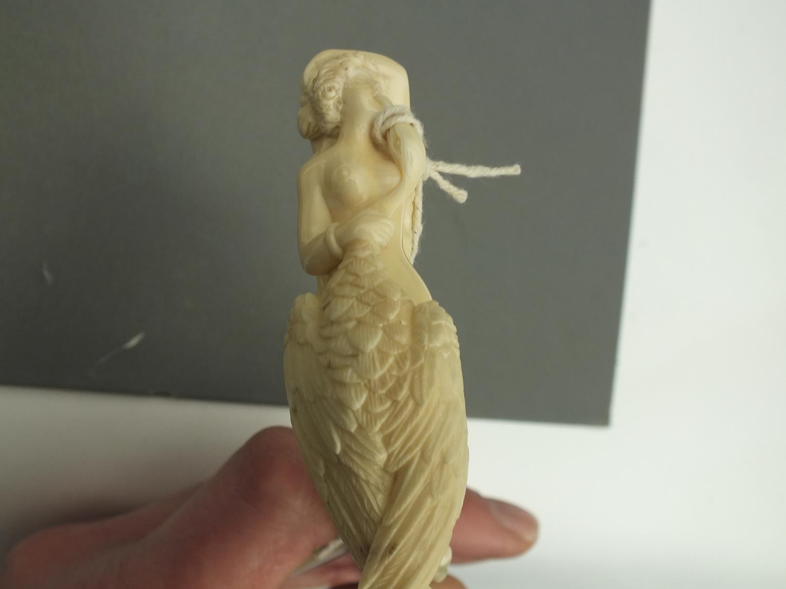 AN EARLY 20TH CENTURY WALKING CANE, the ivory candle carved as Leda and the Swan, above 18ct gold - Image 9 of 10