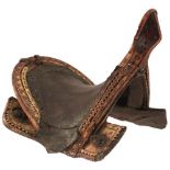 A VERY FINE LATE 16TH OR EARLY 17TH CENTURY GERMAN SADDLE, of characteristic wood and leather