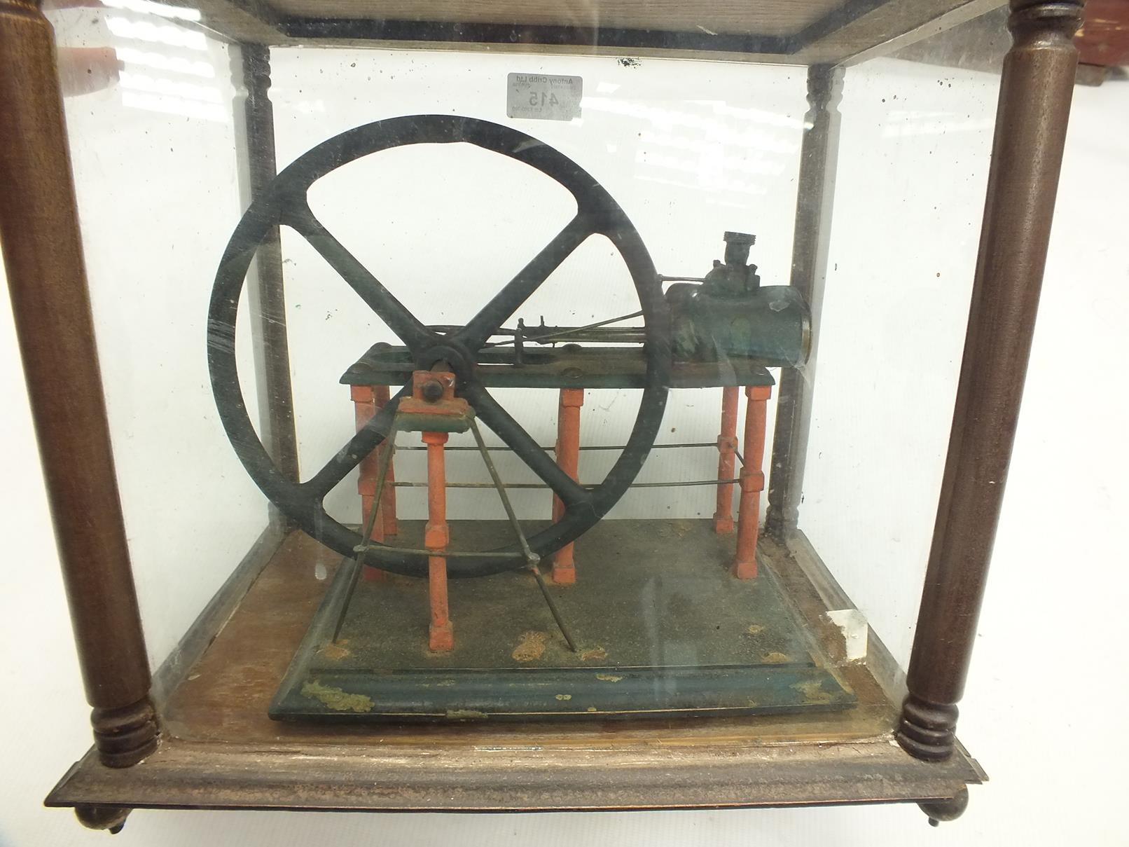 A PAINTED LIVE STEAM MODEL OF A HORIZONTAL MILL ENGINE, mounted on a wooden plinth and contained - Image 6 of 8