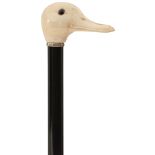 AN EARLY 20TH CENTURY WALKING CANE, the substantial ivory handle carved as a duck's head with