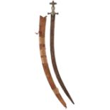 A TULWAR, 82cm sharply curved blade crudely decorated along its entire length with foliage and