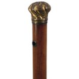 A LATE 19TH CENTURY WALKING CANE, the handle of plated spiralled cushion form, malacca haft