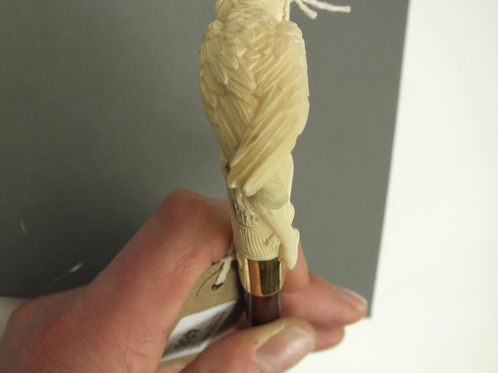 AN EARLY 20TH CENTURY WALKING CANE, the ivory candle carved as Leda and the Swan, above 18ct gold - Image 10 of 10