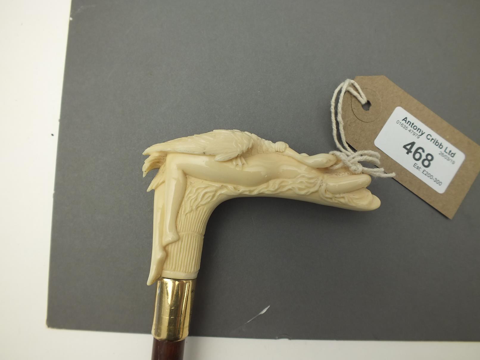 AN EARLY 20TH CENTURY WALKING CANE, the ivory candle carved as Leda and the Swan, above 18ct gold - Image 3 of 10