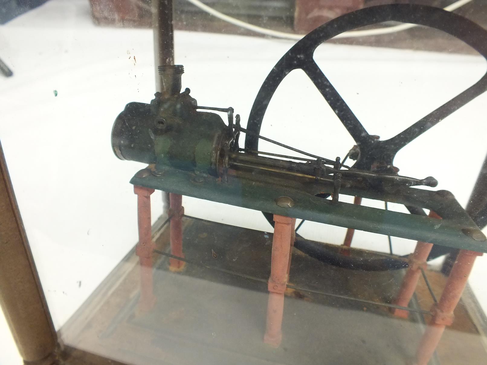 A PAINTED LIVE STEAM MODEL OF A HORIZONTAL MILL ENGINE, mounted on a wooden plinth and contained - Image 3 of 8