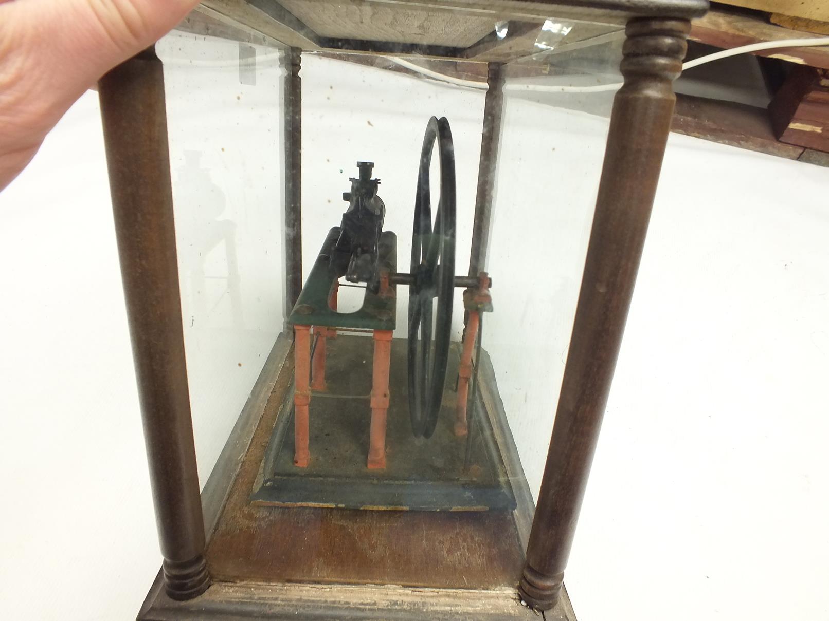 A PAINTED LIVE STEAM MODEL OF A HORIZONTAL MILL ENGINE, mounted on a wooden plinth and contained - Image 5 of 8