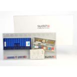 Swatch, Collectorsbox + 4 Uhren (Chrono, Scuba, Olympia Edition u.a.), neuwertig Swatch,