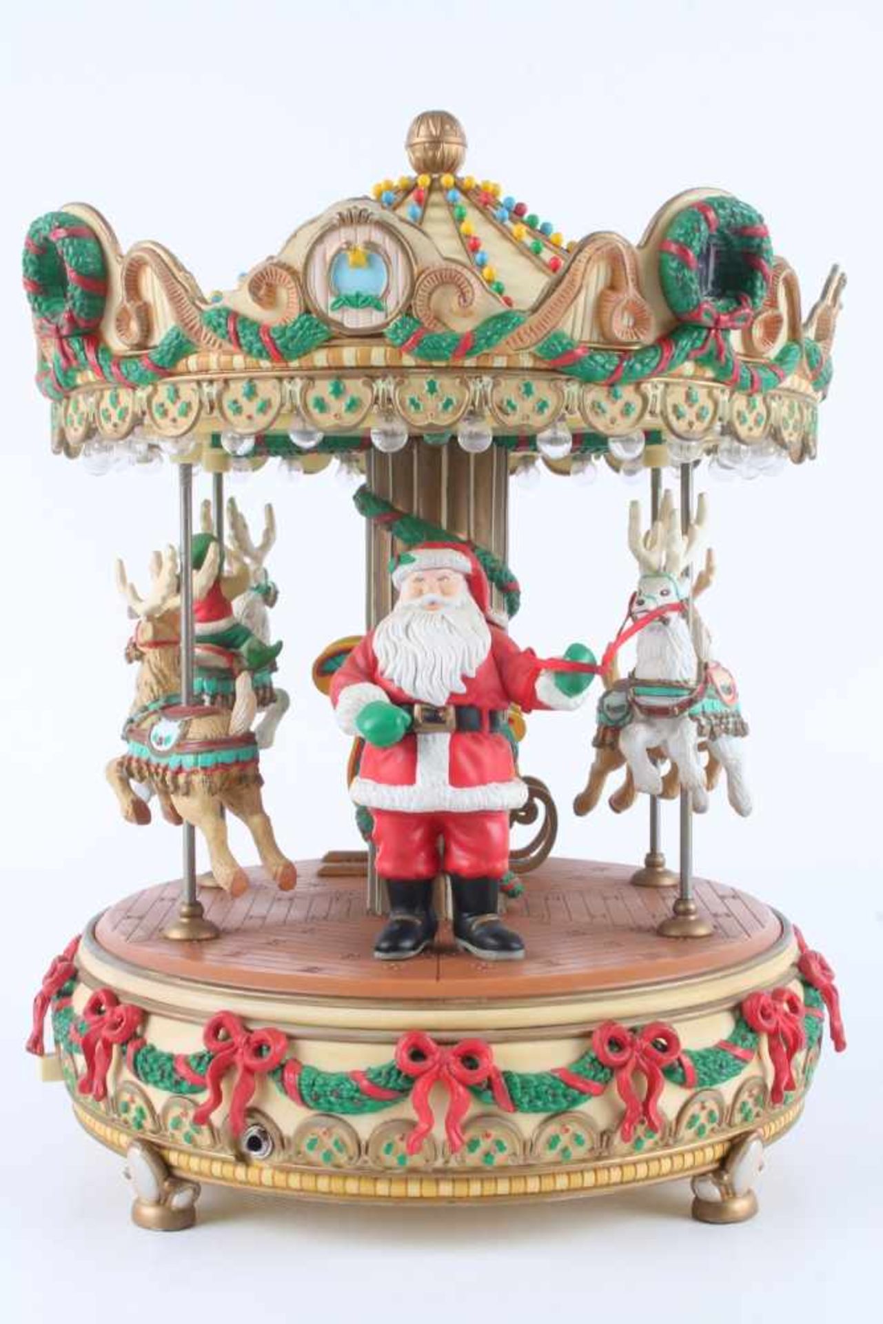 Große Spieluhr Weihnachts-Karussell von ENESCO,H 26,5 cm x D 21 cm, aus Kunststoff, 20. Jh.,