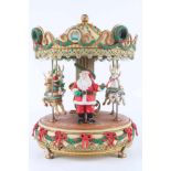 Große Spieluhr Weihnachts-Karussell von ENESCO,H 26,5 cm x D 21 cm, aus Kunststoff, 20. Jh.,