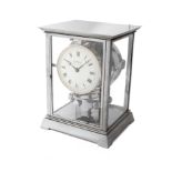 REUTTER, ATMOS, CHROMIUM-PLATED METAL . Fine chromium-plated metal clock, white [...]