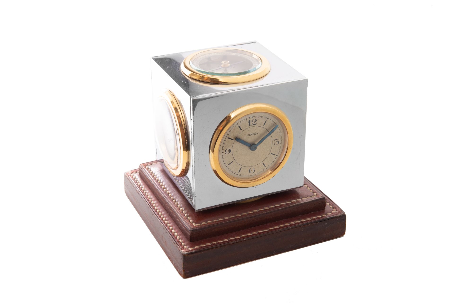 HERMÈS, REF. 141, DESK CLOCK, STAINLESS STEEL, GILT BRASS AND LEATHER . Interesting [...]