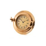 JAEGER-LECOULTRE AND HERMÈS, HUBLOT DESK CLOCK, GILT BRASS. Fine gilt brass porthole [...]