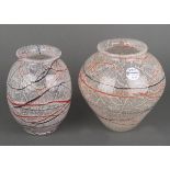 Zwei Vasen. WMF Ikora 20. Jh. Farbloses Glas, mit bunten fadenförmigen Einschmelzungen in Netzdekor,