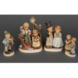 Vier Kinderfiguren bzw. -gruppen, u.a.: Hausmusik, Fürs Vaterle, Hochzeit. Goebel 20. Jh.